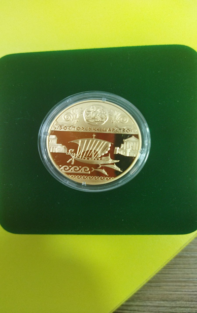 Золота пам`ятна монета серії «Античні пам`ятки України» «Боспорське царство», номінал 100 гривень, метал Au 900, маса в чистоті 31,1 гр.